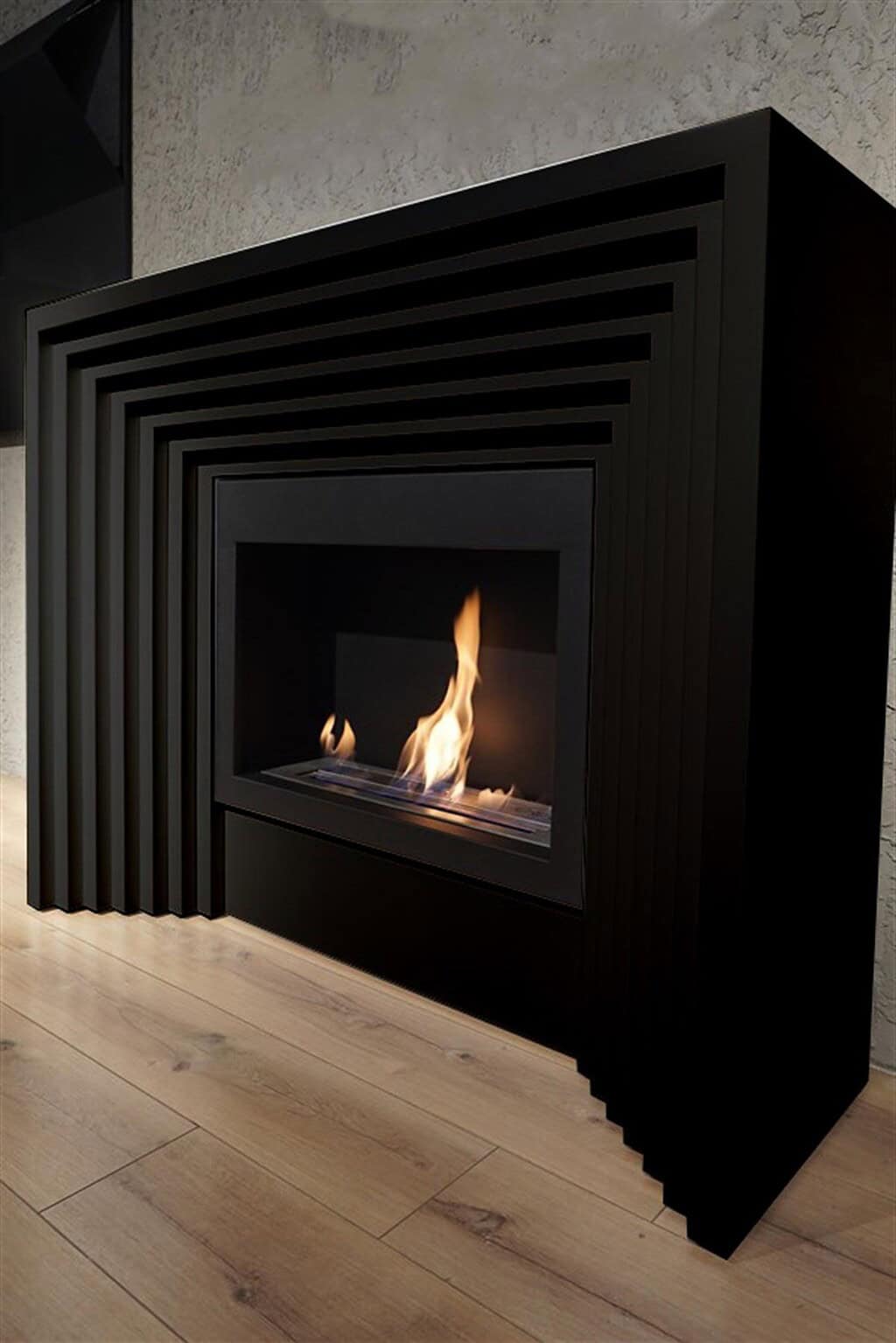 A modern fireplace with a black mantle.